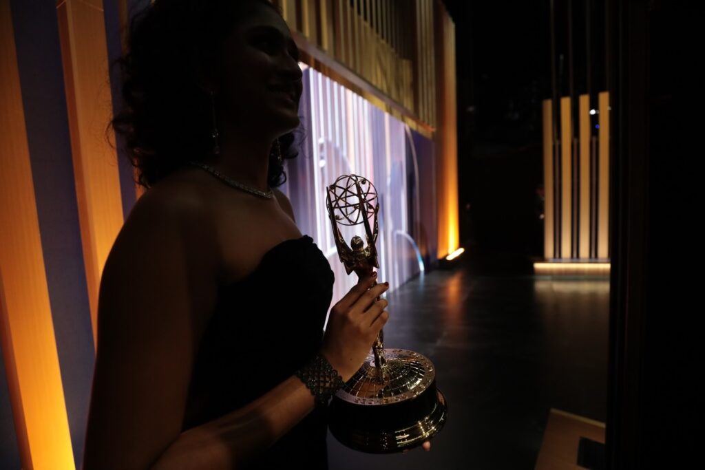 UM alum Geethika Kataru presents a trophy at the 75th Emmy Awards on Monday, Jan. 15 at the Peacock Theater in Los Angeles.