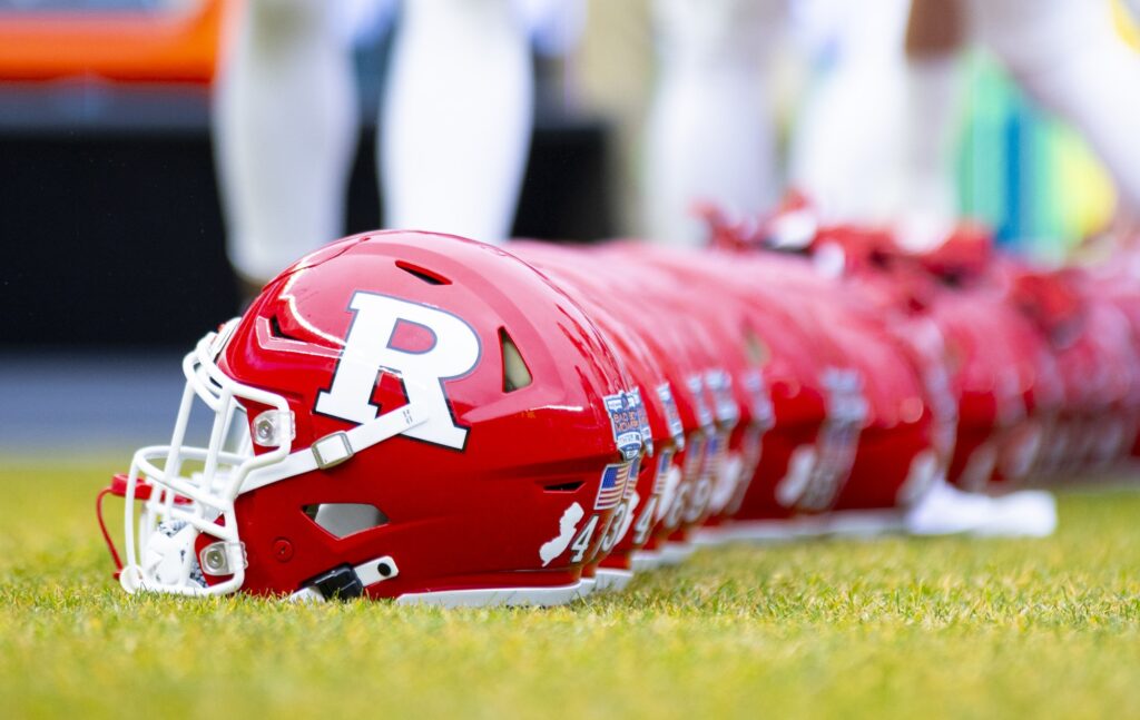 Rutgers helmets are lined up on the field during warmups ahead of the Pinstripe Bowl at Yankee Stadium on Dec. 28, 2023.