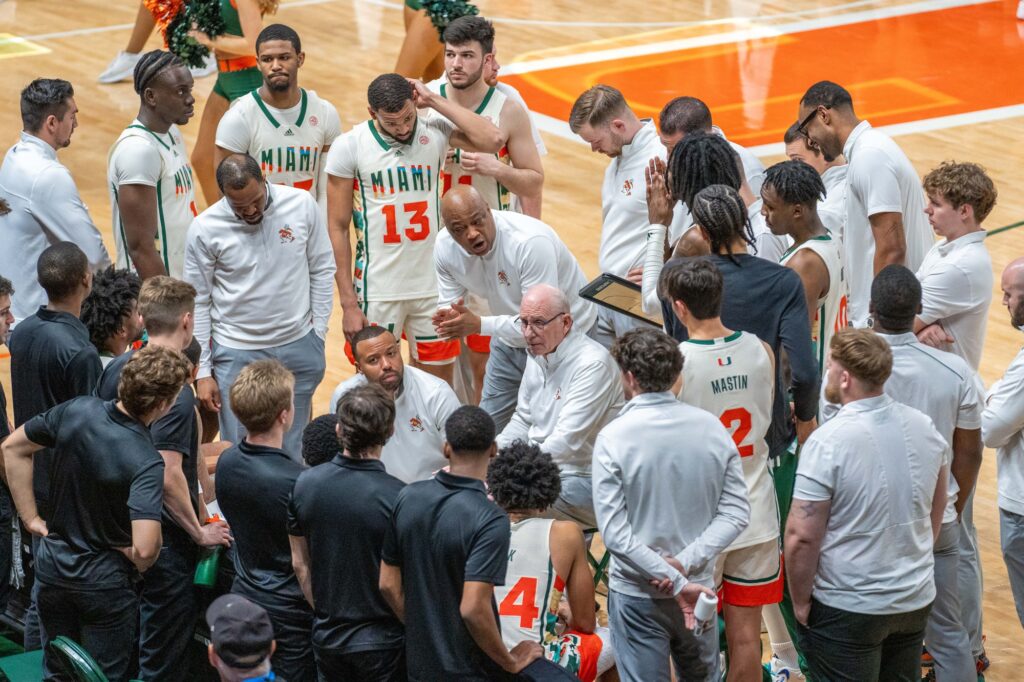 Associate head coach Bill Courtney speaks to the team during a timeout in the second half of Miami’s game versus the University of North Carolina in the Watsco Center on Feb. 10, 2024.