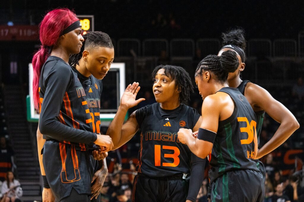 Before inbounding the ball, junior Latasha Lattimore, sophomore Zee Spearman, juniors Lashae Dwyer and Shayeann Day-Wilson, and graduate student Jaida Patrick huddle together and talk about their strategy against FSU during the six-point loss.