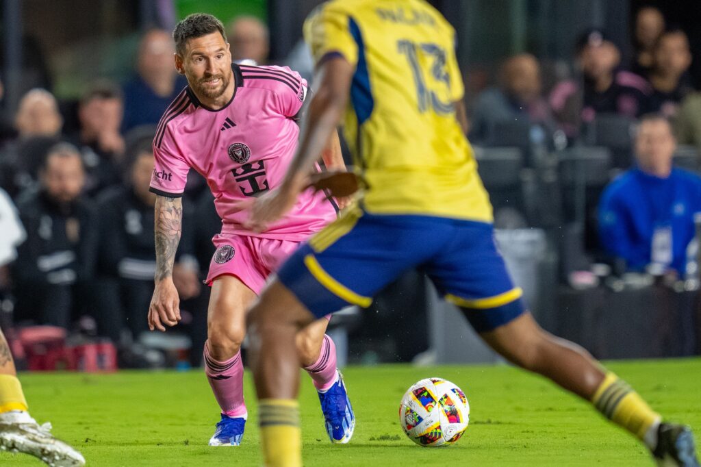 Inter Miami forward Lionel Messi dribbles downfield in the first half of Inter Miami’s match versus Real Salt Lake at Chase Stadium on Feb. 21, 2024.
