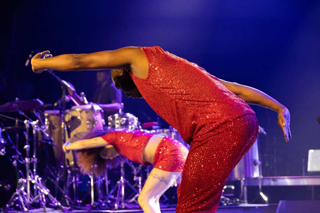 Background dancer performs at the Montreux Jazz Festival in Miami at the Bayshore Club on Saturday, March 2.