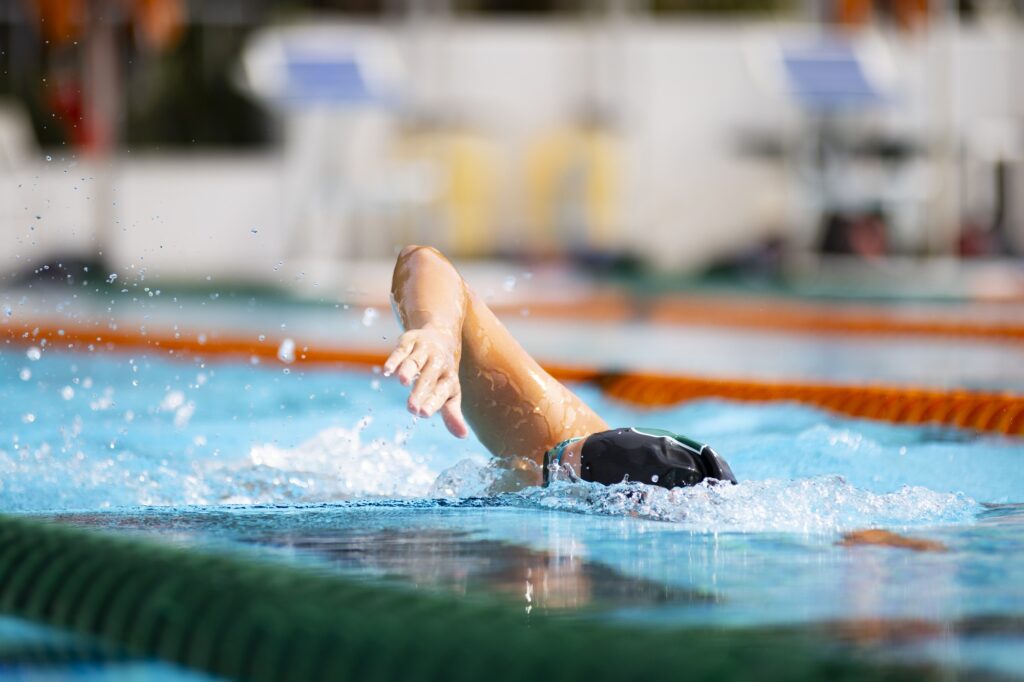 Miami swimmer competes in the freestyle during the First Chance Meet at the Whitten Center Pool on Feb. 16, 2024.