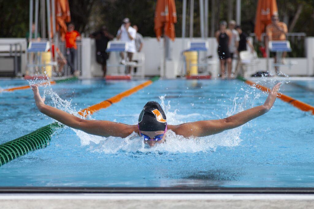 Miami swimmer finishes a butterfly lap during the First Chance Meet at the Whitten Center Pool on Feb. 16, 2024.