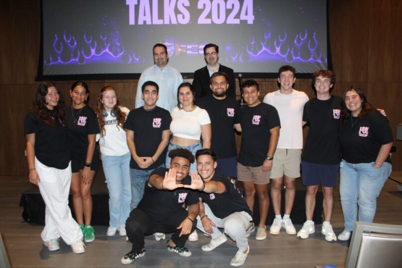 Students pose at "Cafecito Talks 2024" with Dr. Michael Bustamante and Dr. Daniel Pedreira. Photo Courtesy of FEC.