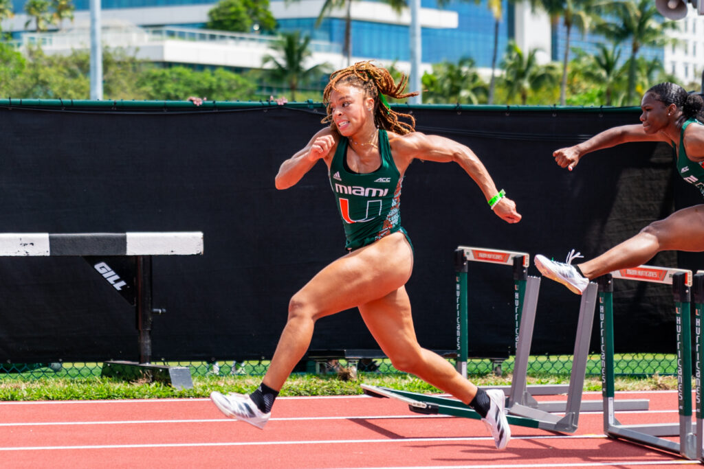 Graduate student Christina Warren participates in the women’s 100 meter hurdles where she finished in 13.69 seconds, earning fifth place on the second day of the Hurricane Invitational March 16, 2024.