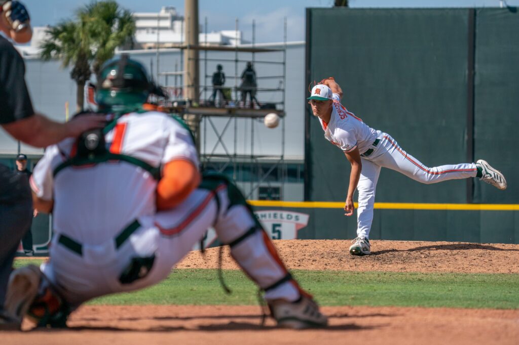 Freshman pitcher Rafe Schlesinger pitches at the top of the eighth inning of Miami’s game versus the University of Virginia at Mark Light Field on April 10, 2022.
