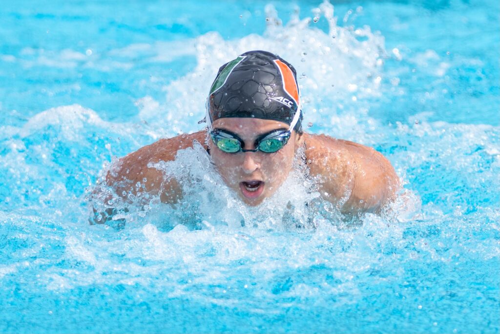 A swimmer competes during the Miami First Chance Meet at the Whitten Center Pool on Feb. 16, 2024.