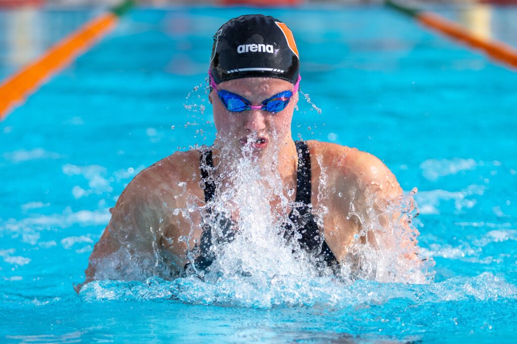 A swimmer competes during the Miami First Chance Meet at the Whitten Center Pool on Feb. 16, 2024.