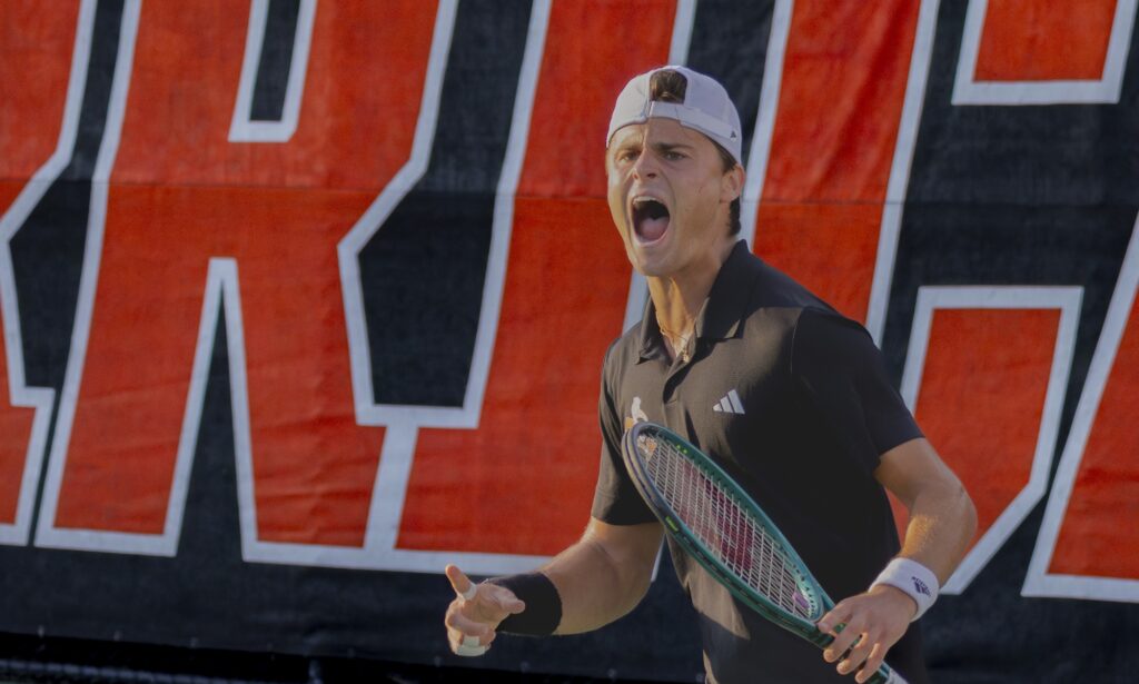 Sophomore Antonio Prat celebrates winning a set in a singles match at the Schiff Tennis Center on Feb. 23, 2024.