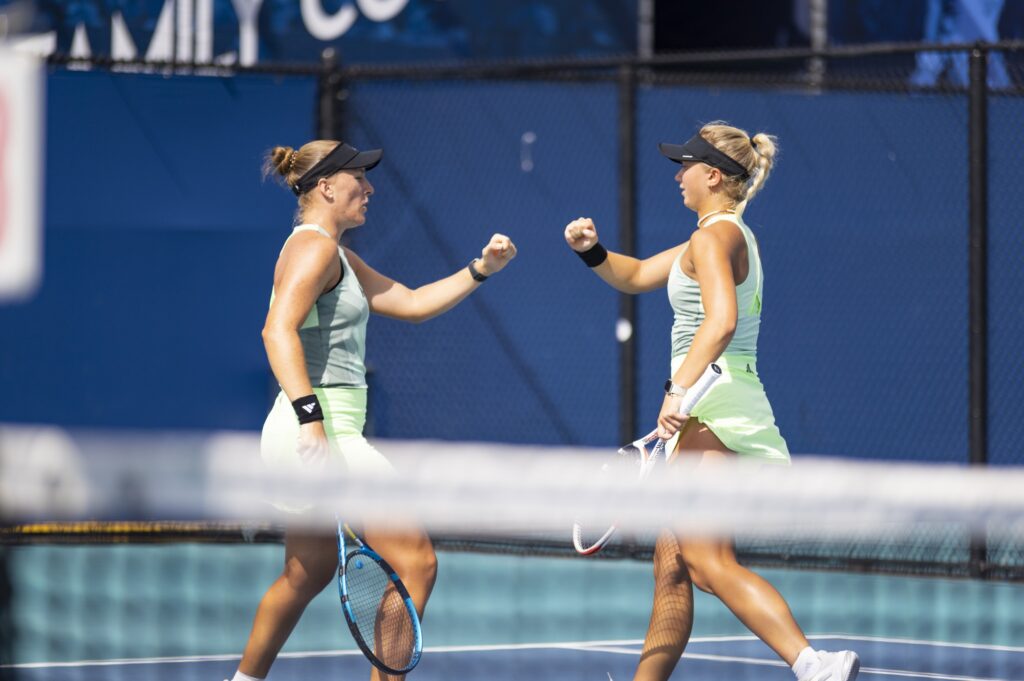 True senior Leonie Schuknecht and fifth-year senior Antonia Balzert fist bump during their doubles match against Boston College's Serena Agar and Nada Dimovska at the Miami Open at Hard Rock Stadium on March 29, 2024.