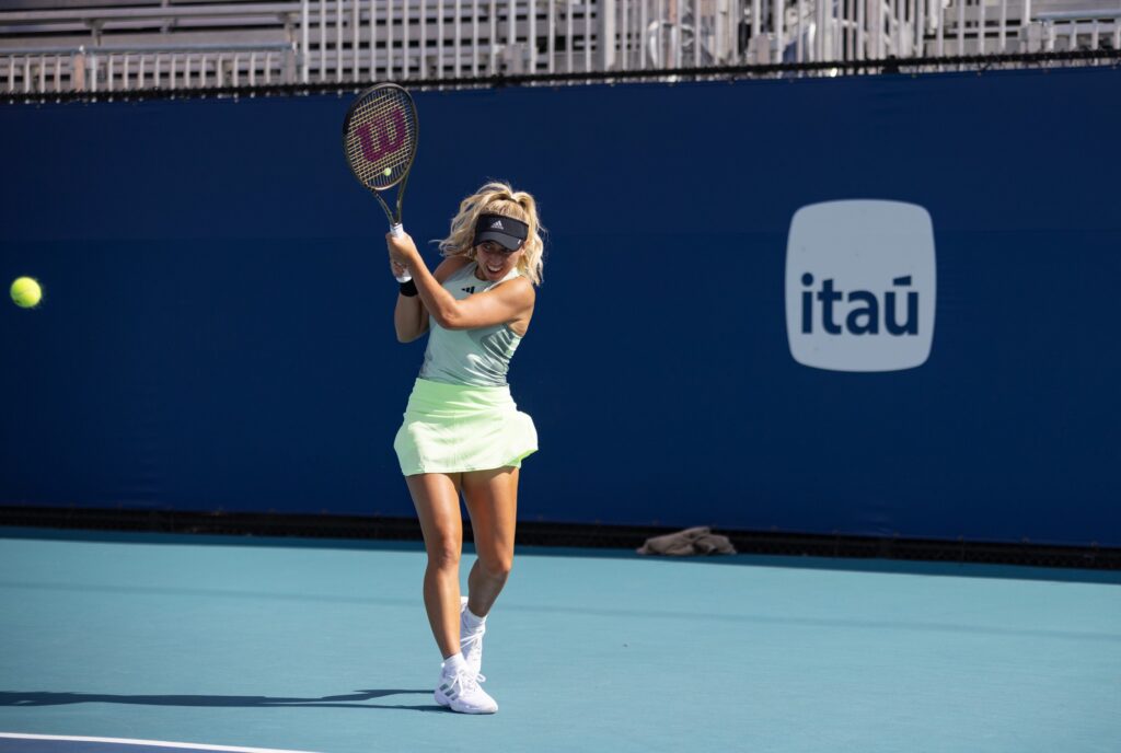 Senior Isabella Pfennig hits a backhand during her singles match against Boston College's Natalie Eordekian at the Miami Open at Hard Rock Stadium on March 29, 2024.