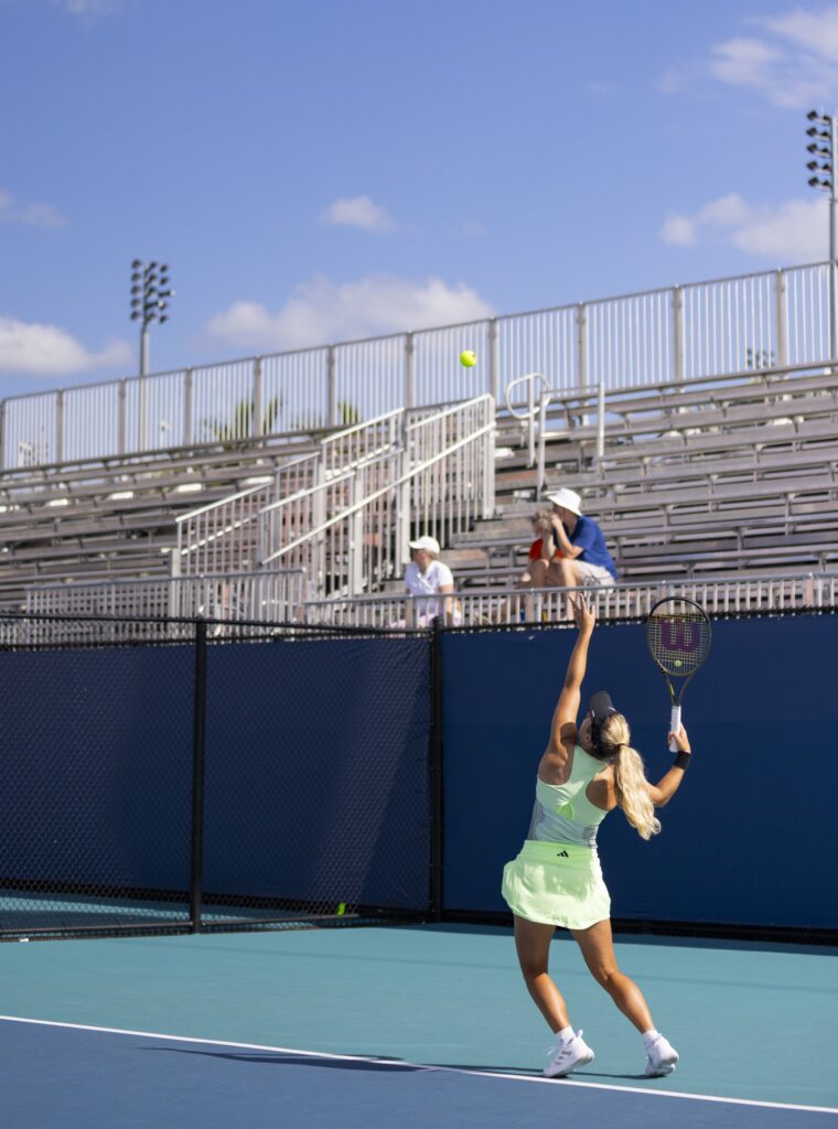 Senior Isabella Pfennig winds up to serve during her singles match against Boston College's Natalie Eordekian at the Miami Open at Hard Rock Stadium on March 29, 2024.